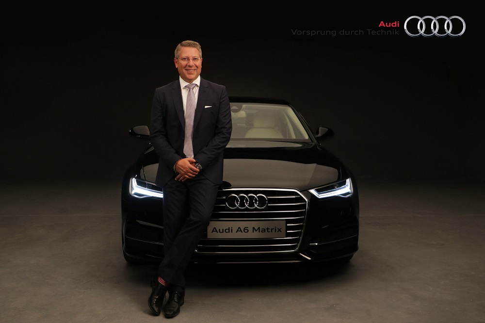 Mr. Joe King, Head, Audi India with the new Audi A6 Matrix. The car has been exceptionally priced at INR 49,50,000 ex-showroom New Delhi and Mumbai