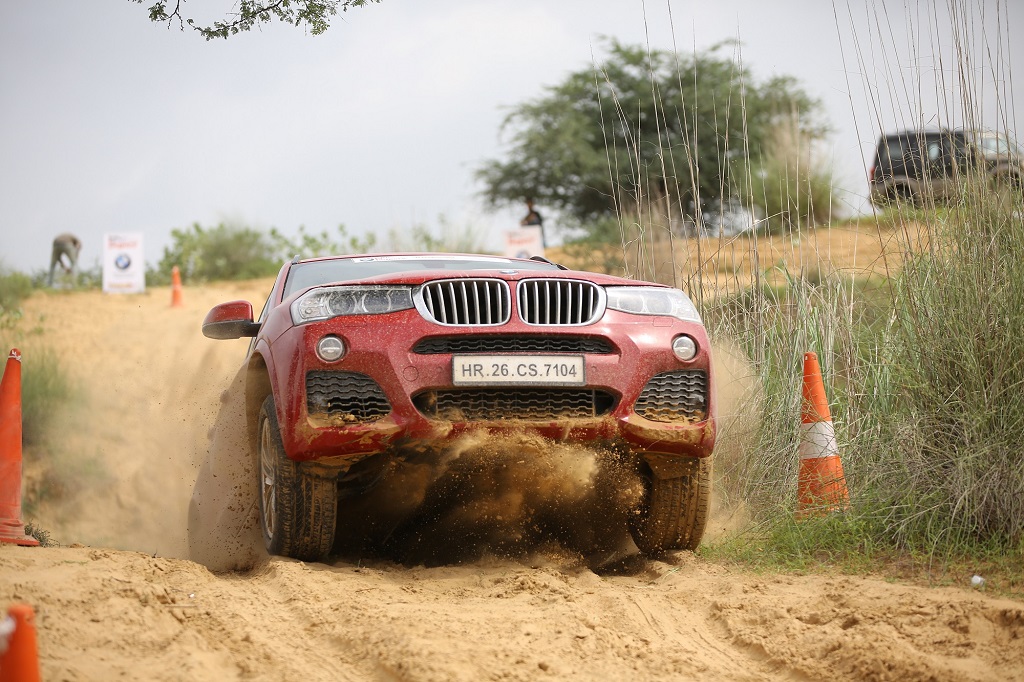 03.The BMW X3 in action at Super Speciality Stage of Rally of Jaypore 2016