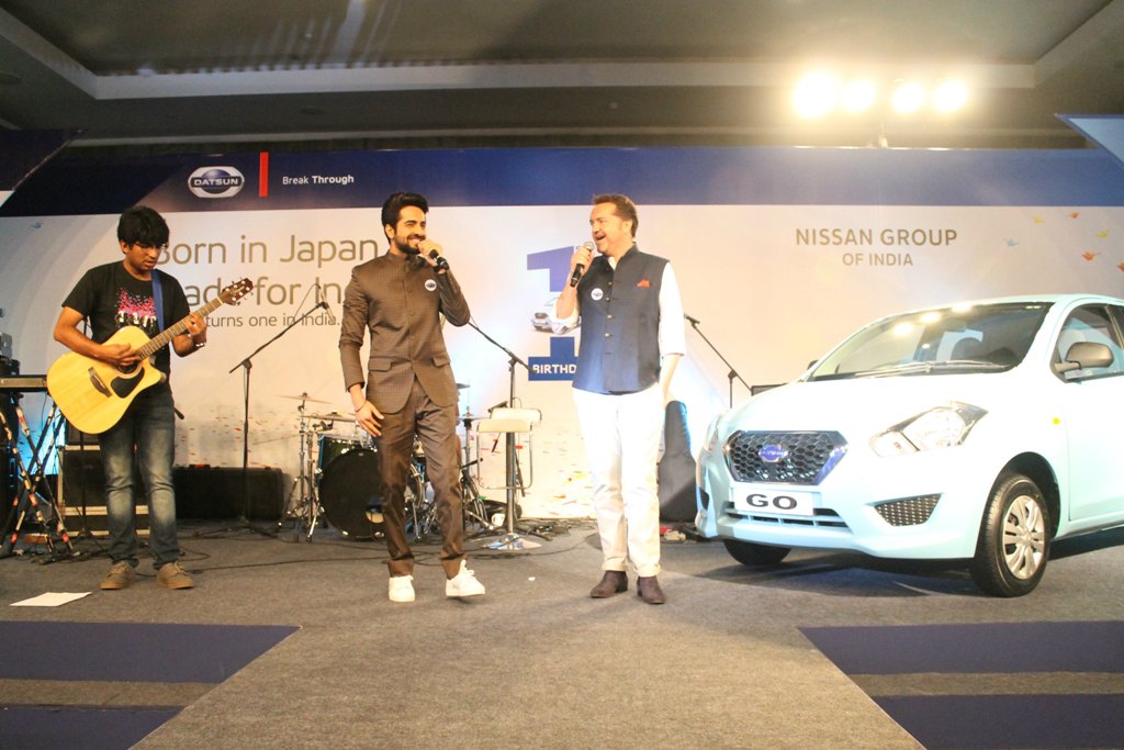 Bollywood star Ayushmann Khurrana & Guillaume Sicard-President,Nissan India operations jamming at Datsun's first anniversary