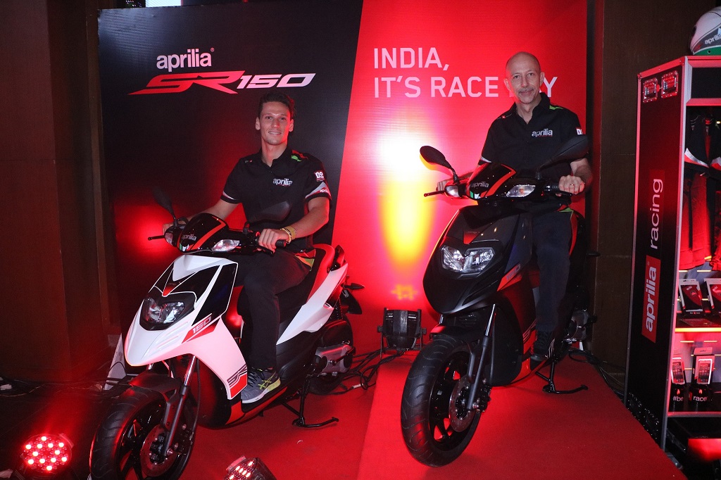(L to R)) Lorenzo Savadori, 2015 World Champion of Superstock bike racing alongwith Mr. Stefano Pelle, Managing Director and CEO – PVPL at the launch of SR 150 in Mumbai