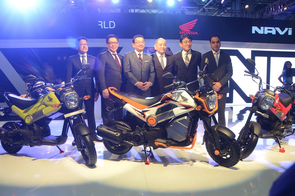 Officials from Honda Motorcycle & Scooter India Pvt. Ltd. Launching NAVI at the AUTO EXPO 2016