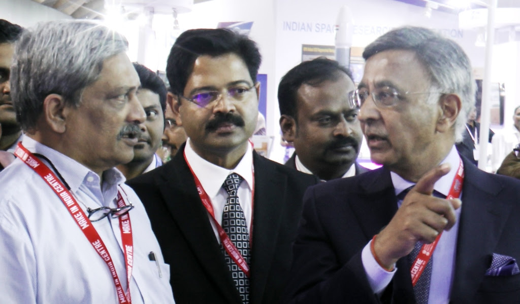 Honourable Defence Minister Shri Manohar Parikkar with Baba N. Kalyani, Chairman and Managing Director, Bharat Forge Limited during his visit to the company’s booth in Defence Pavilion at Make In India Week Centre