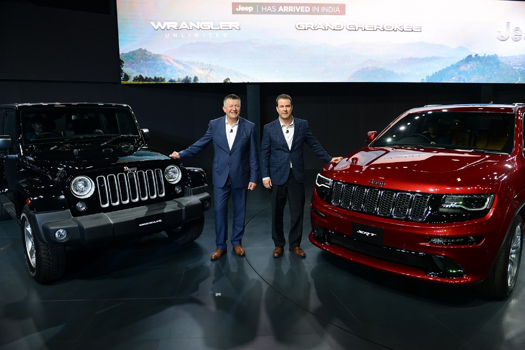 jim-morrison-and-kevin-flynn-with-the-newly-unveiled-vehicles-from-jeep