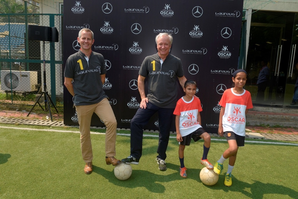 mr-roland-folger-md-ceo-mercedes-benz-india-and-andy-griffiths-global-director-laureus-sport-for-good-all-set-to-play-football-with-oscar-foundation-kids