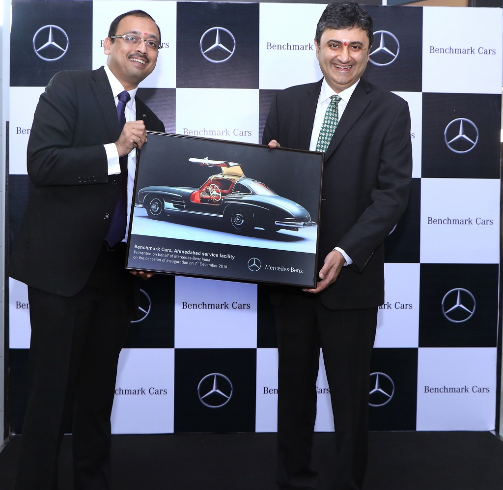 mr-santosh-iyer-vp-after-sales-and-retail-training-mercedes-benz-india-presenting-a-memento-to-mr-sanjay-thakker-chairman-benchmark-cars-at-ahmedabad-workshop